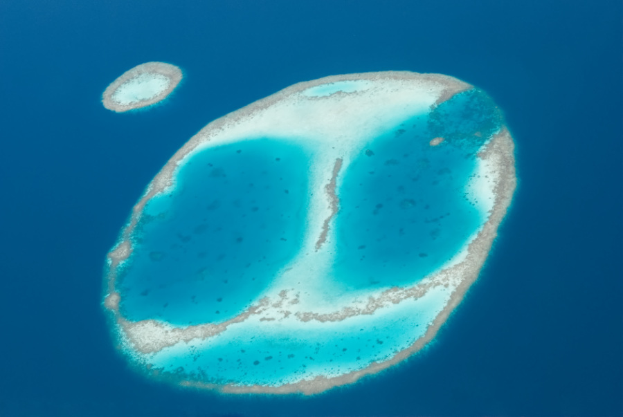 Atoll between Male and Filitheyo seen from the air, Maldives