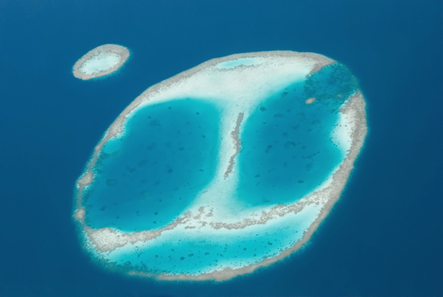 Atoll between Male and Filitheyo seen from the air, Maldives