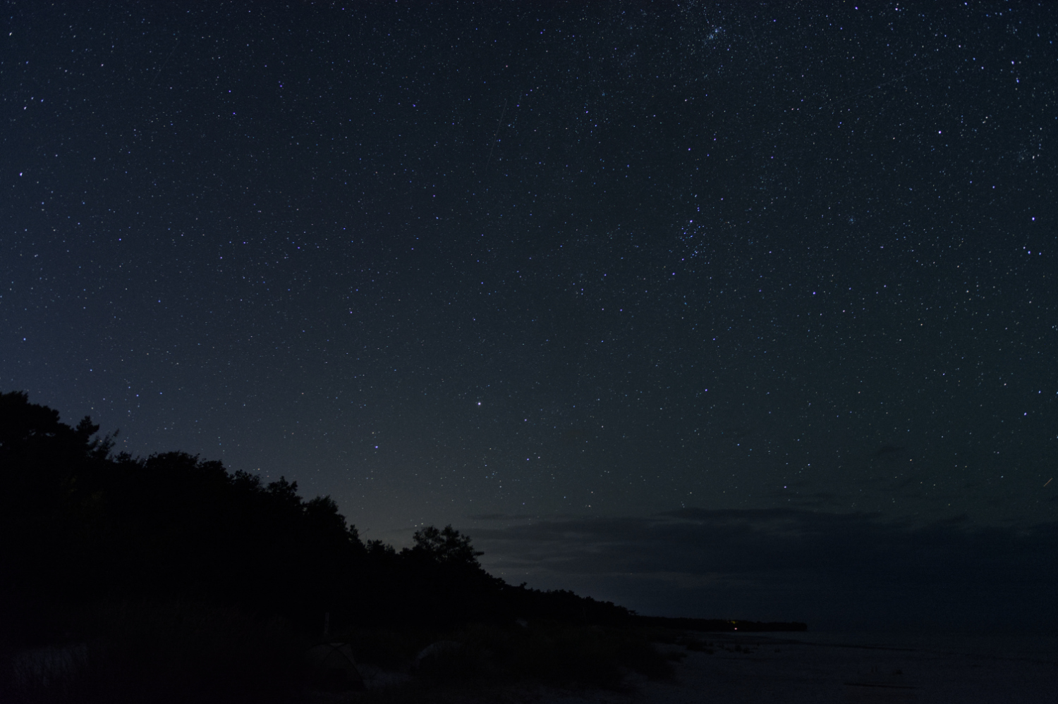 Stars and Milky Way at the beach of Bornholm