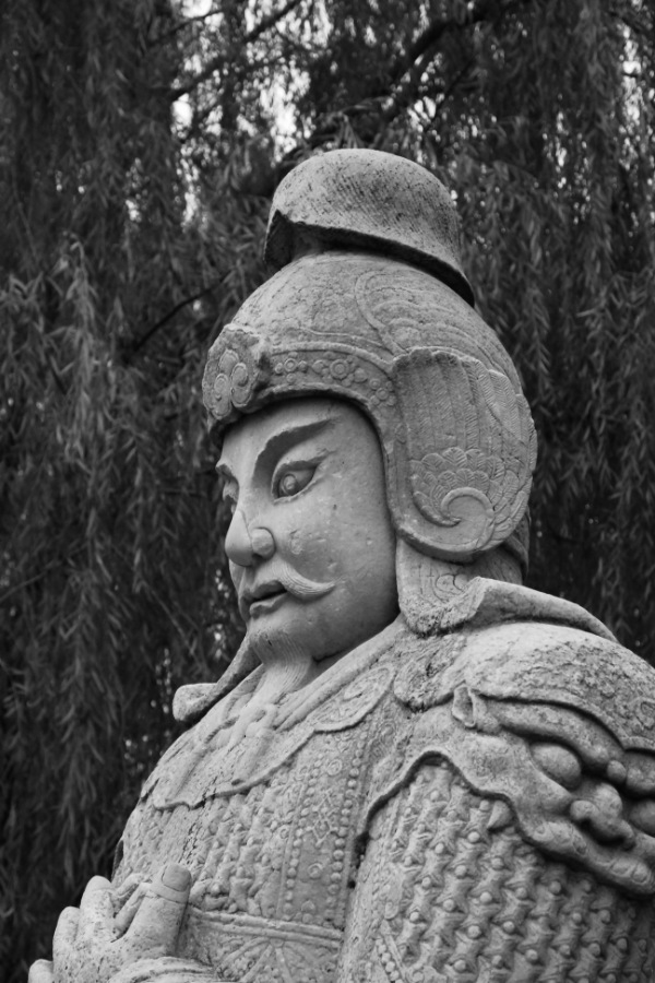 Statue of an emperor Ming dynasty in Beijing in black and white