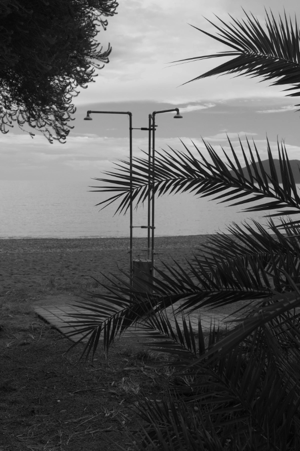 Beach shower, off season in black and white