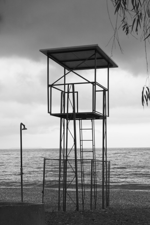 Life guard watch tower in Plaka off season, black and white