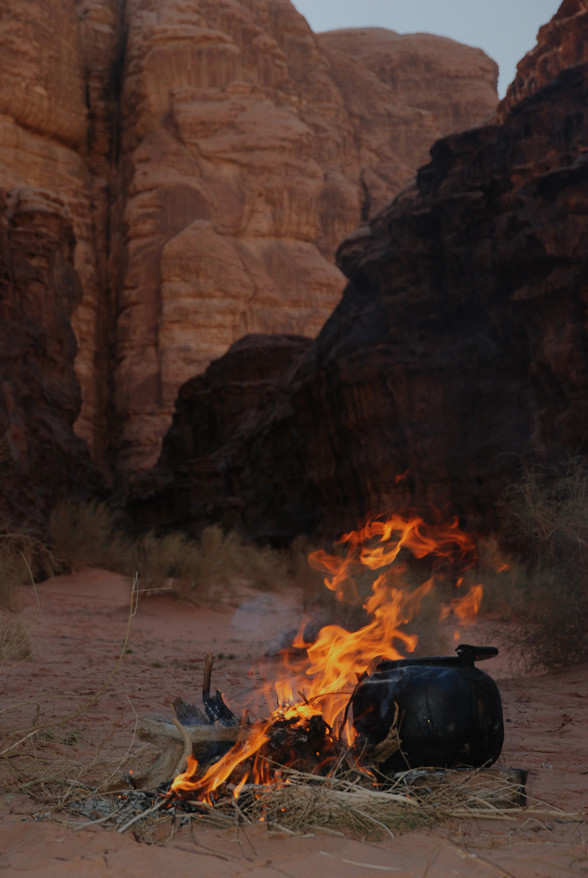Fire in Wadi Rum in evening twilight